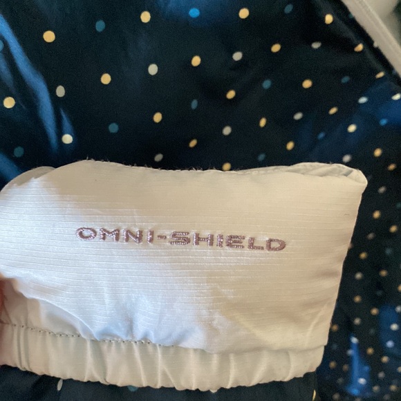 Reversible Columbia Titanium coat filled with down and feathers. - Picture 4 of 5